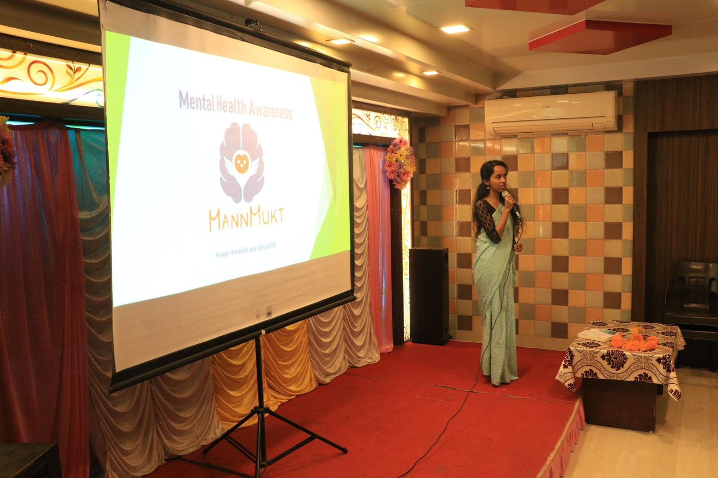 A speaker presenting at the MannMukt awareness meet