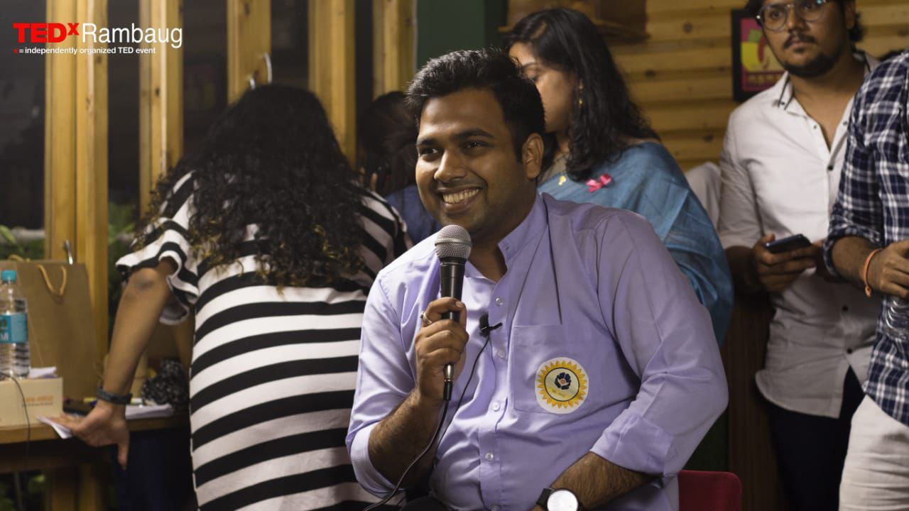 A speaker at the TEDxRambaug #KaiseHo? event